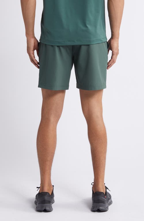 Shop Rhone Essentials 7-inch Gym Shorts In Jungle Green