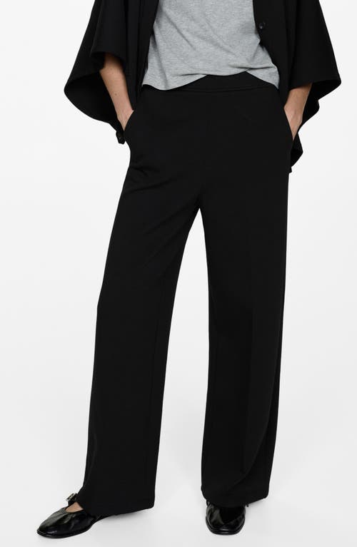 Shop Mango Flowy Stretch Pants In Black