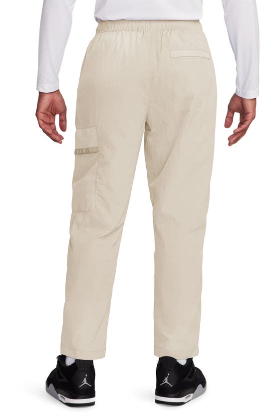 Shop Jordan Woven Cargo Pants In Legend Light Brown/ White