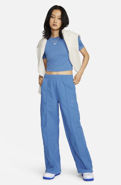 Shop Nike Wide Leg Pants In Star Blue/metallic Copper