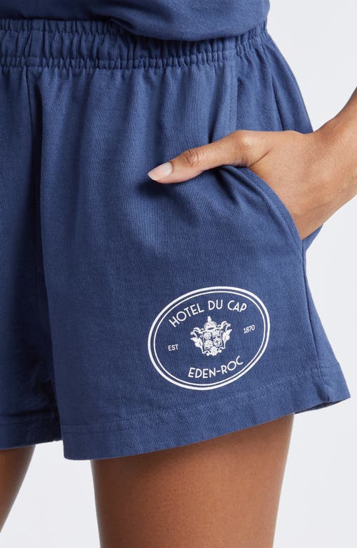 Shop Sporty And Rich Sporty & Rich Eden Crest Cotton Disco Shorts In Indigo