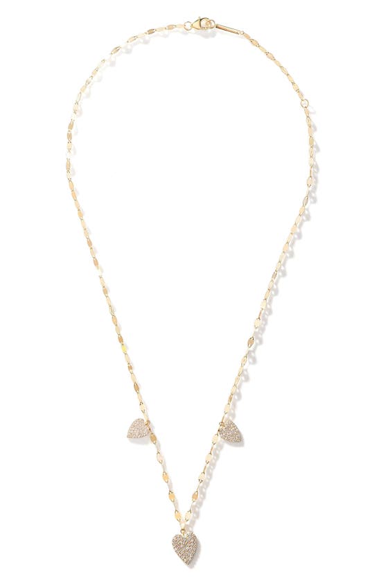 Shop Lana Triple Heart Charm Necklace In Yellow Gold