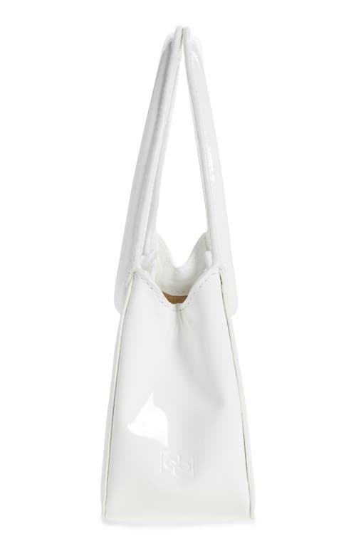 Shop Reformation Mini Luciana Frame Handle Bag In White Patent