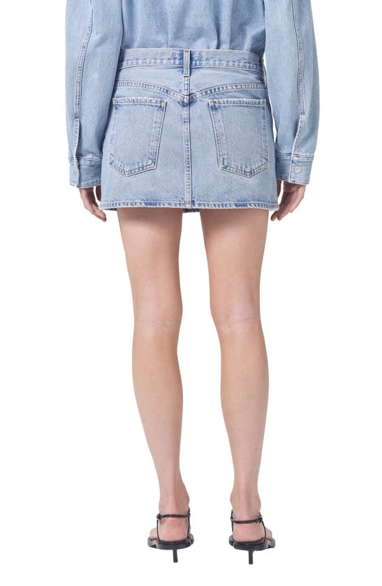 Shop Agolde Alek Denim Miniskirt In Force