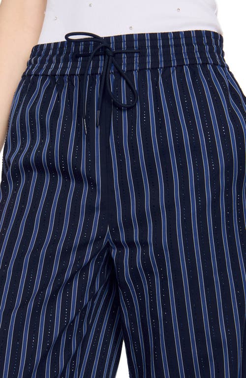 Shop Sandro Striped Trousers In Blue