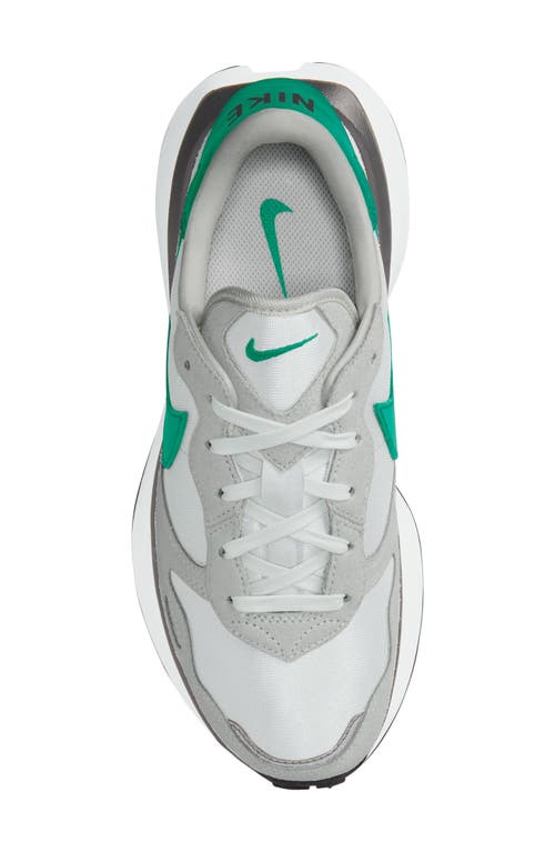 Shop Nike Phoenix Waffle Sneaker In Summit White/green/photon