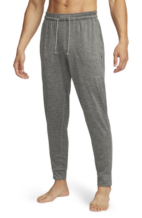 NIKE NIKE YOGA DRI-FIT JERSEY JOGGERS