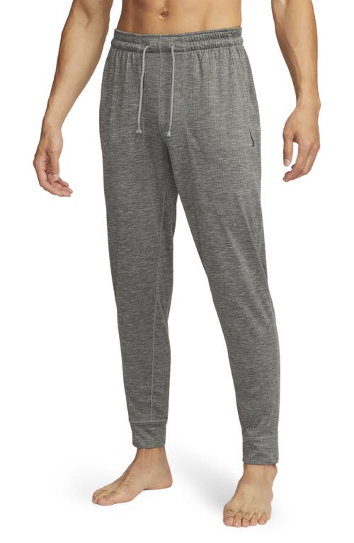 Nike Yoga Dri-fit Jersey Joggers In Gray