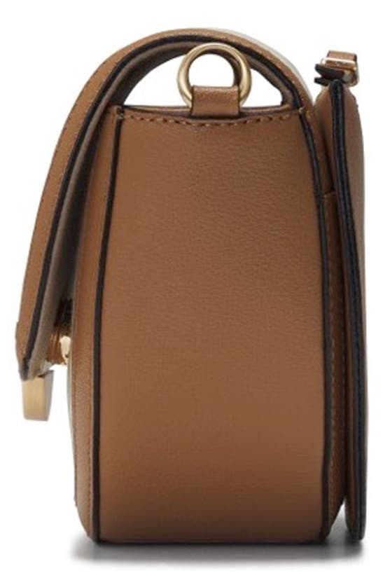 Oryany Lottie Saddle Canvas Crossbody Bag In Sand Brown