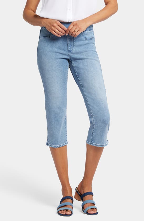 Shop Nydj Dakota Side Slit Pull-on Capri Jeans In Corfu