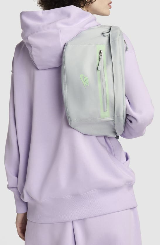 Shop Nike Elemental Belt Bag In Light Silver/ Vapor Green