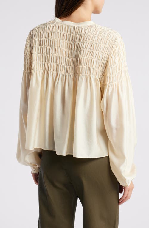 Shop Frame Smocked Silk Blend Top In Champagne