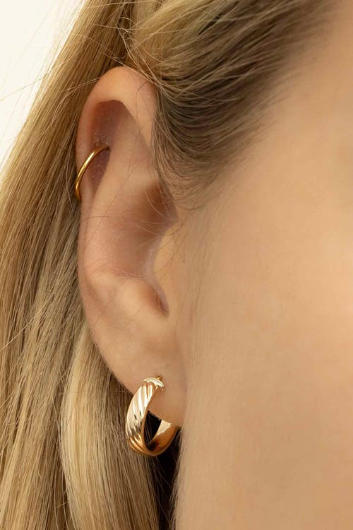Oradina 14k Yellow Gold With A Twist Mini Hoops In Yellow Gold