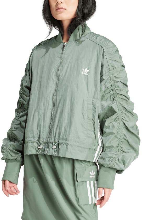 Shop Adidas Originals Oversize Ruched Sleeve Bomber Jacket In Trace Green