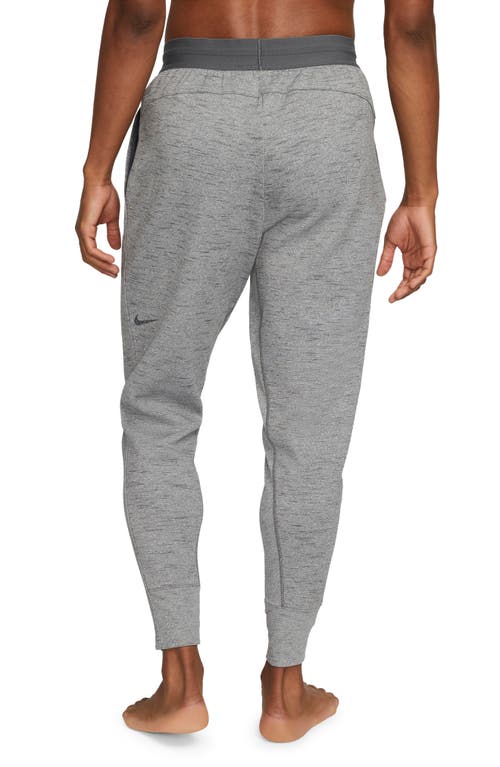 Shop Nike Dri-fit Yoga Pants In Black/iron Grey