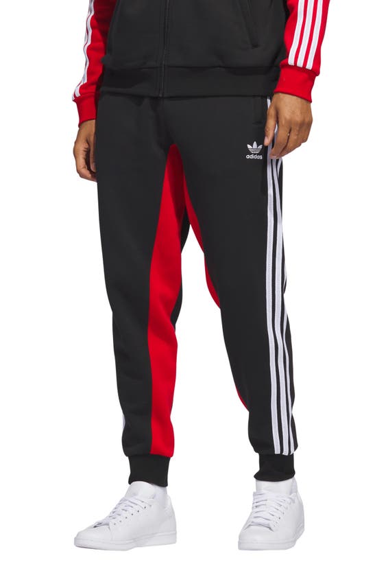 Adidas Originals Sst Fleece Pants In Black/ Shadow Red | ModeSens