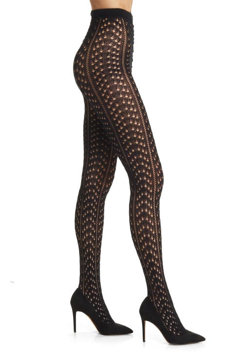 Women's black 20 tights with gold polka dot print