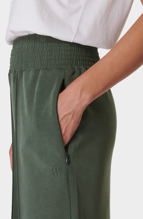 Shop Sweaty Betty Sand Wash Cloud Weight Track Pants In Trek Green