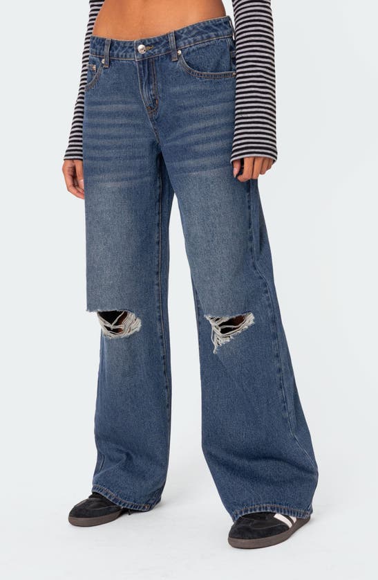 Shop Edikted Debbie Ripped Low Rise Wide Leg Jeans In Indigo-blue-raw-wash
