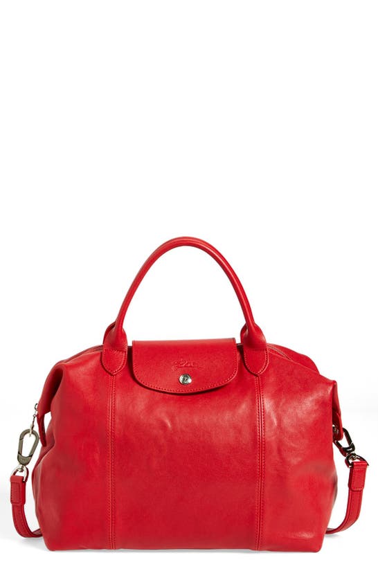 Longchamp - The iconic Le Pliage Cuir bag comes in Cherry