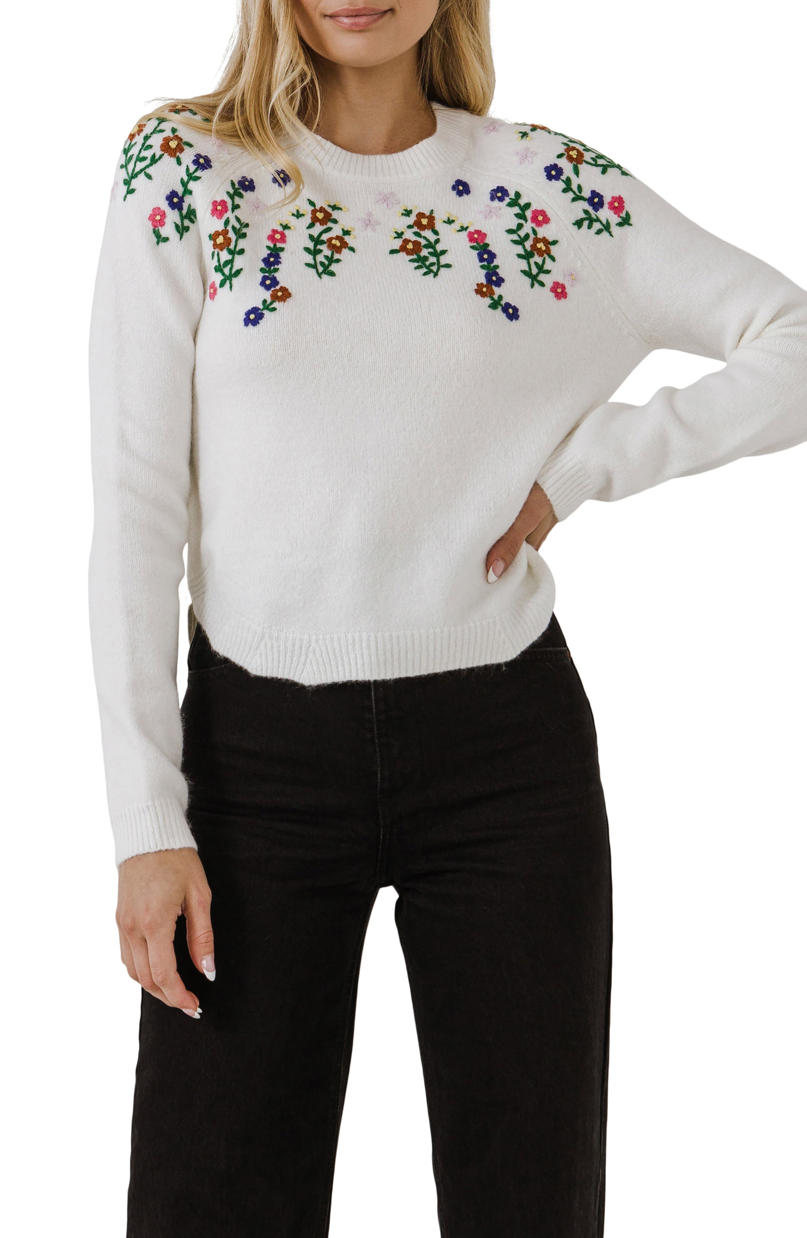 white embroidered sweater