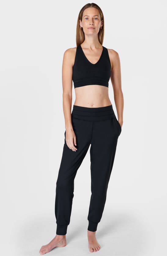 Shop Sweaty Betty Gaia Yoga Sports Bra In Black