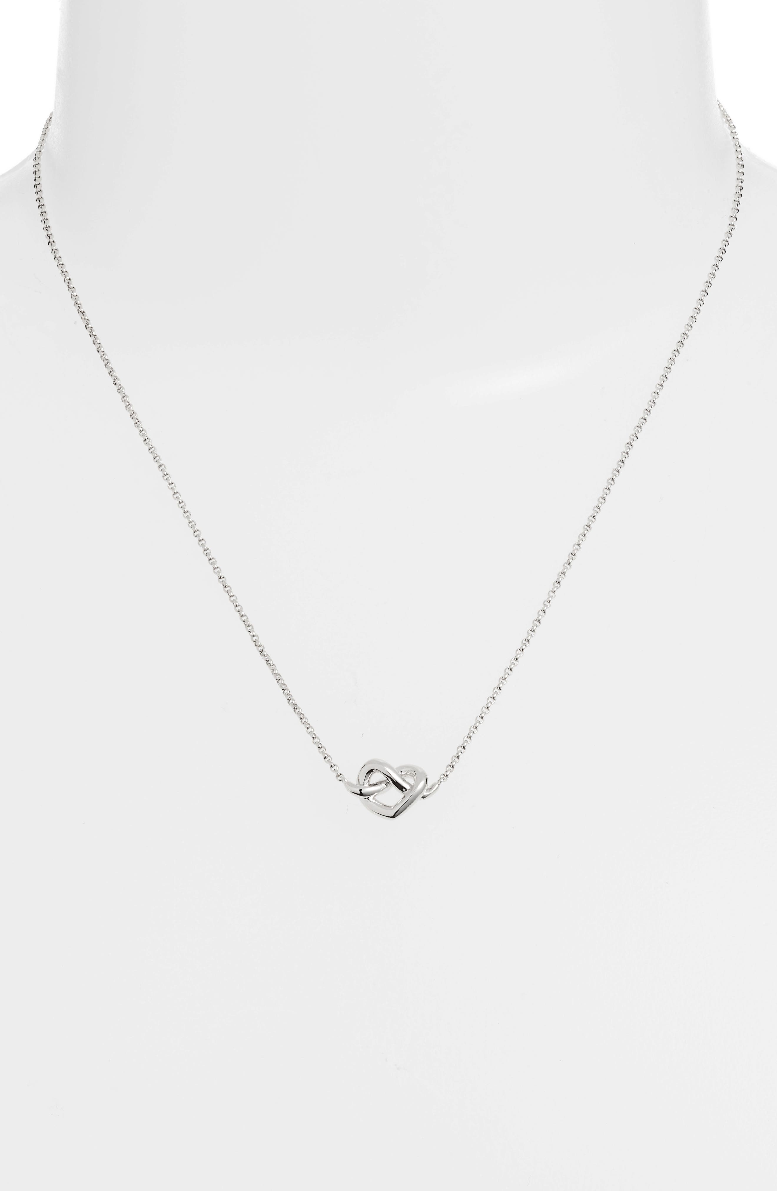 badge holders necklaces kate spade