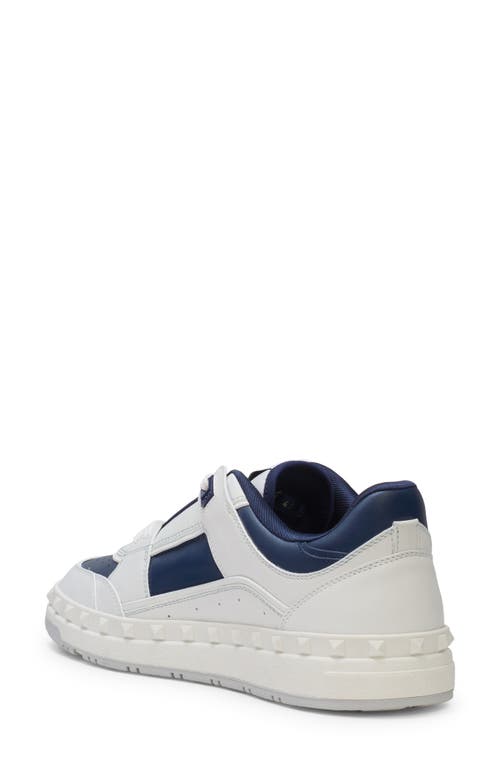 Shop Valentino Garavani Rockstud Low Top Sneaker In Fc6 - Bianco/worker