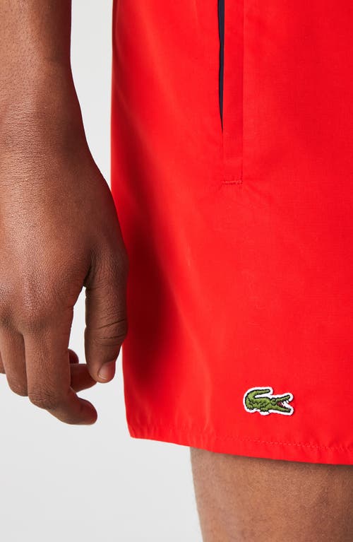 Shop Lacoste Recycled Polyester Swim Trunks In 528 Red/navy Blue