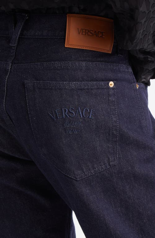 Shop Versace Reactive Straight Leg Jeans In Dark Blue