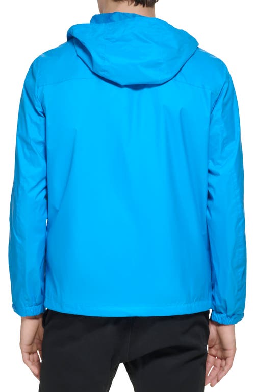 Shop Tommy Hilfiger Hooded Rain Slicker Jacket In Swedish Blue