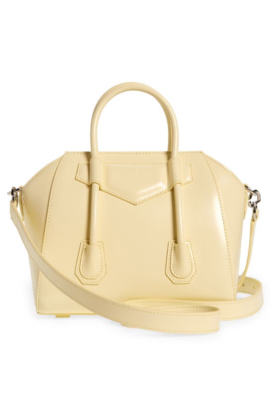 Shop Givenchy Mini Antigona Lock Leather Satchel In Soft Yellow