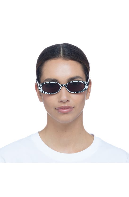 Shop Le Specs Outta Love 51mm Oval Sunglasses In White Tiger / Smokey Brown