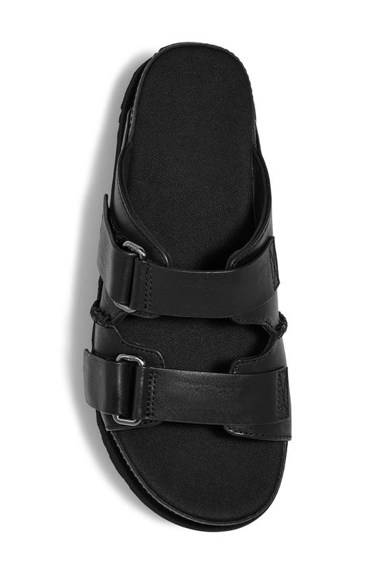 Shop Ugg Goldenstar Platform Slide Sandal In Black