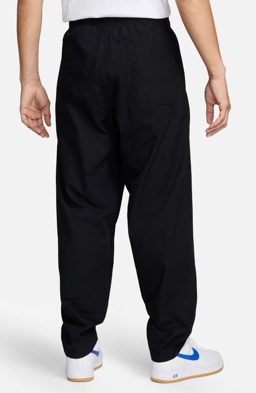 Shop Nike Sportswear Club Barcelona Woven Cotton Pants In Black/black