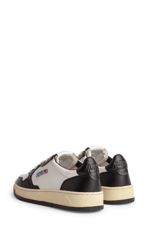 Shop Autry Medalist Low Sneaker In White/black