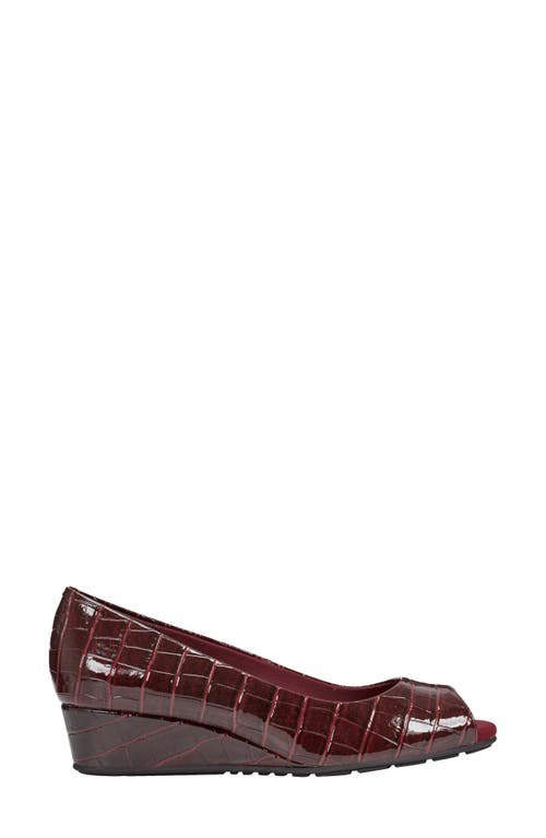 Shop Bandolino Peep Toe Wedge Pump In Dark Red