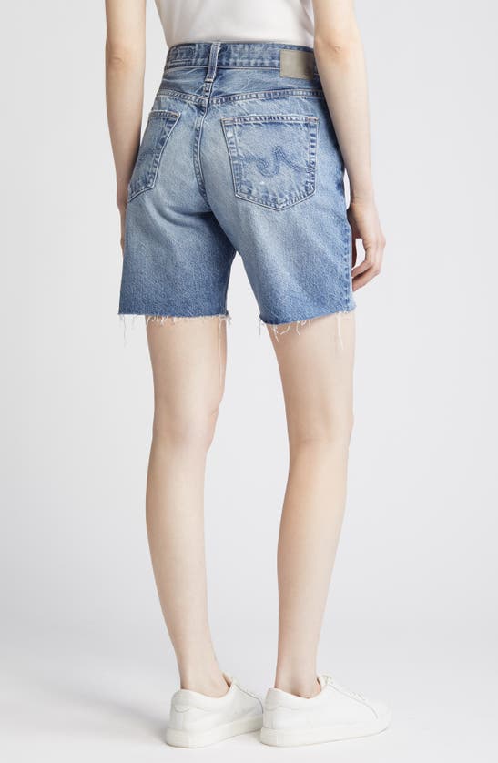 Shop Ag Ex-boyfriend Raw Hem Mid Length Denim Shorts In Myth