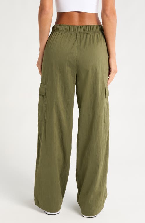 Shop Zella Boundless Utility Pants In Olive Night