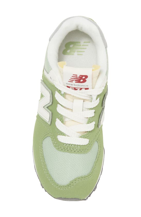 Shop New Balance Kids' 574 Sneaker In Chive/ White