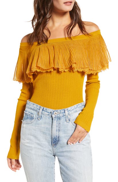 Click to view more detailed imagery on our partner's website English Factory Off The Shoulder Textured Ruffle Sweater In Mustard
