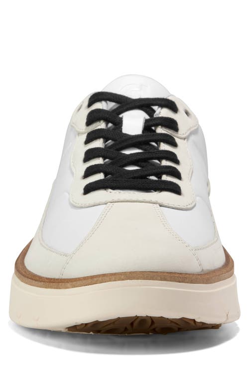 Shop Cole Haan Grandpro Featherarc Sneaker In White/blac