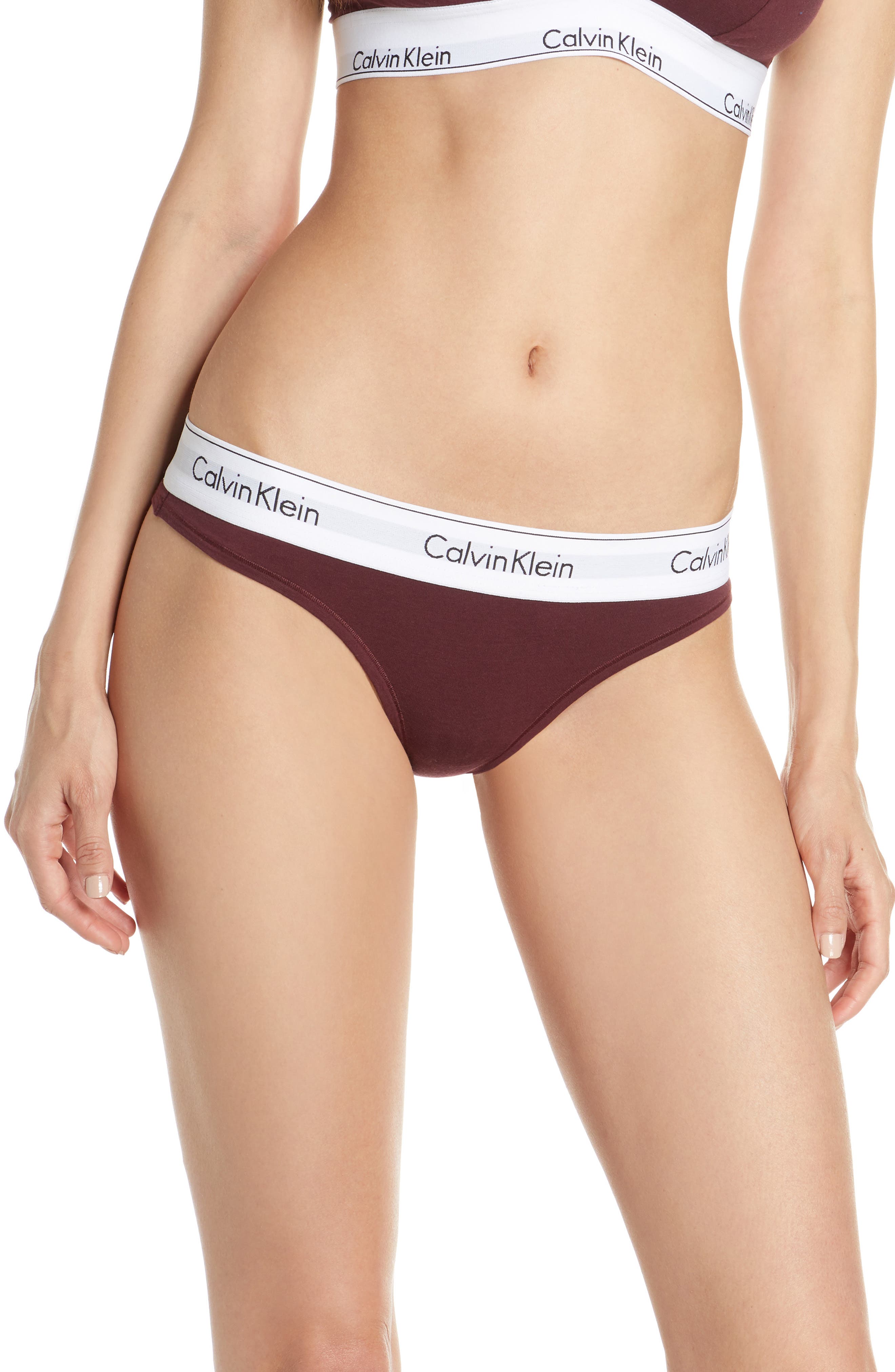 UPC 011531769021 product image for Women's Calvin Klein Logo Thong, Size Small - Burgundy | upcitemdb.com