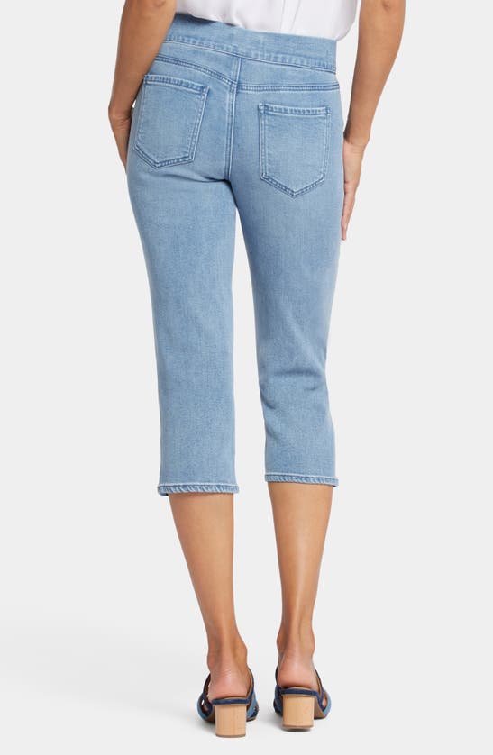 Shop Nydj Dakota Side Slit Pull-on Capri Jeans In Corfu