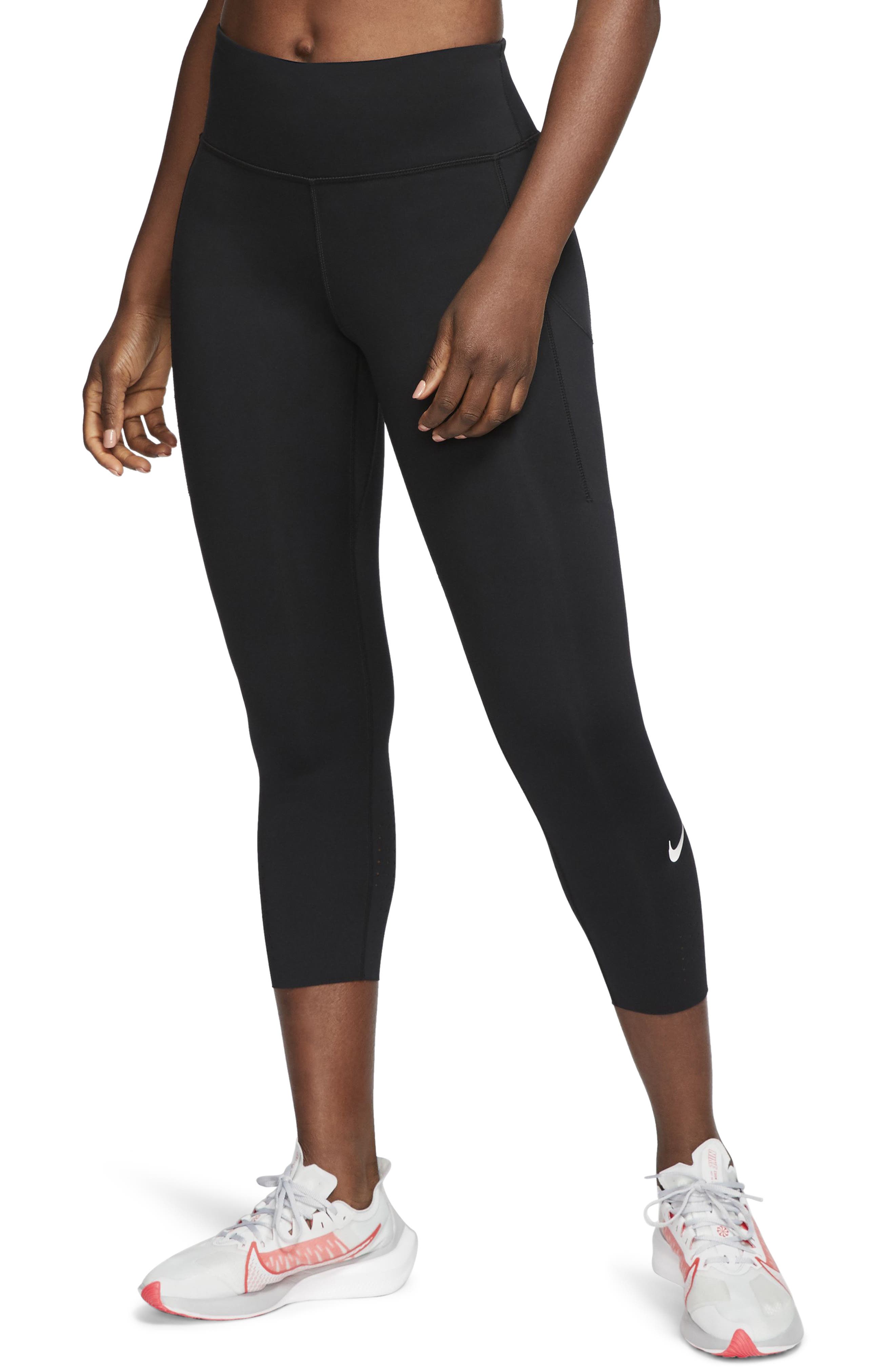 nike training crop leggings with gold sparkle trim in pink