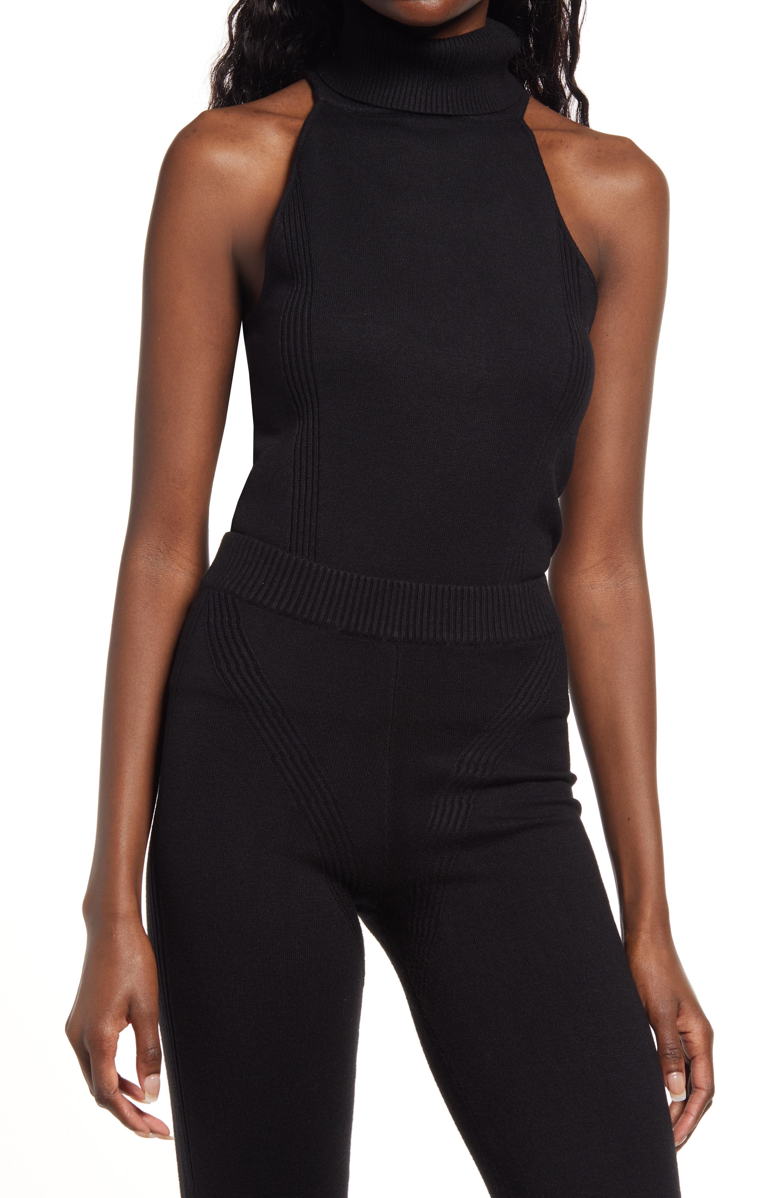 black turtleneck sleeveless sweater