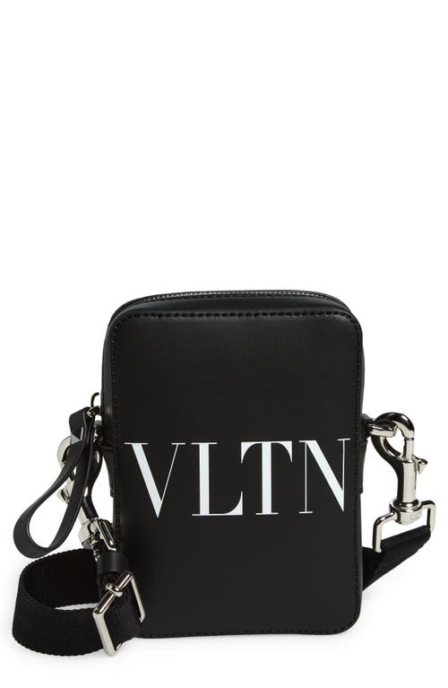 Shop Valentino Garavani Small Vltn Logo Leather Crossbody Bag In Nero/bianco