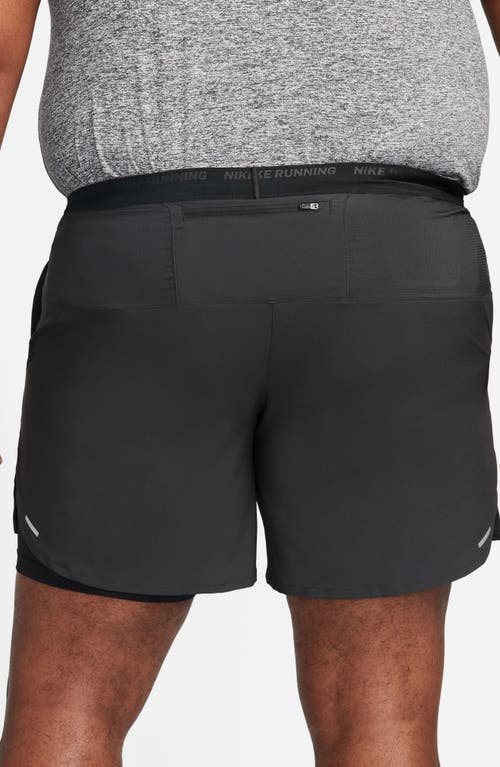 Shop Nike Dri-fit Stride 2-in-1 Running Shorts In Black/black/silver