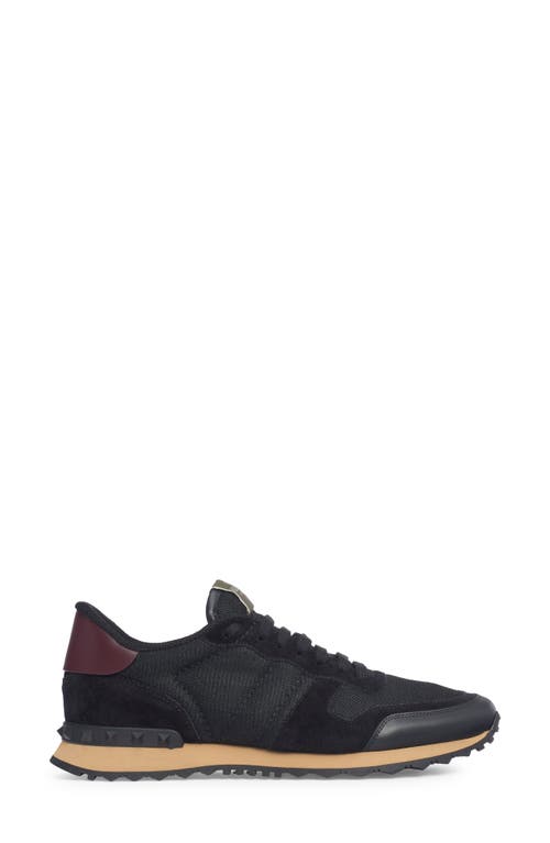 Shop Valentino Garavani Rockrunner Sneaker In Nero/nero-nero/nero-rubin