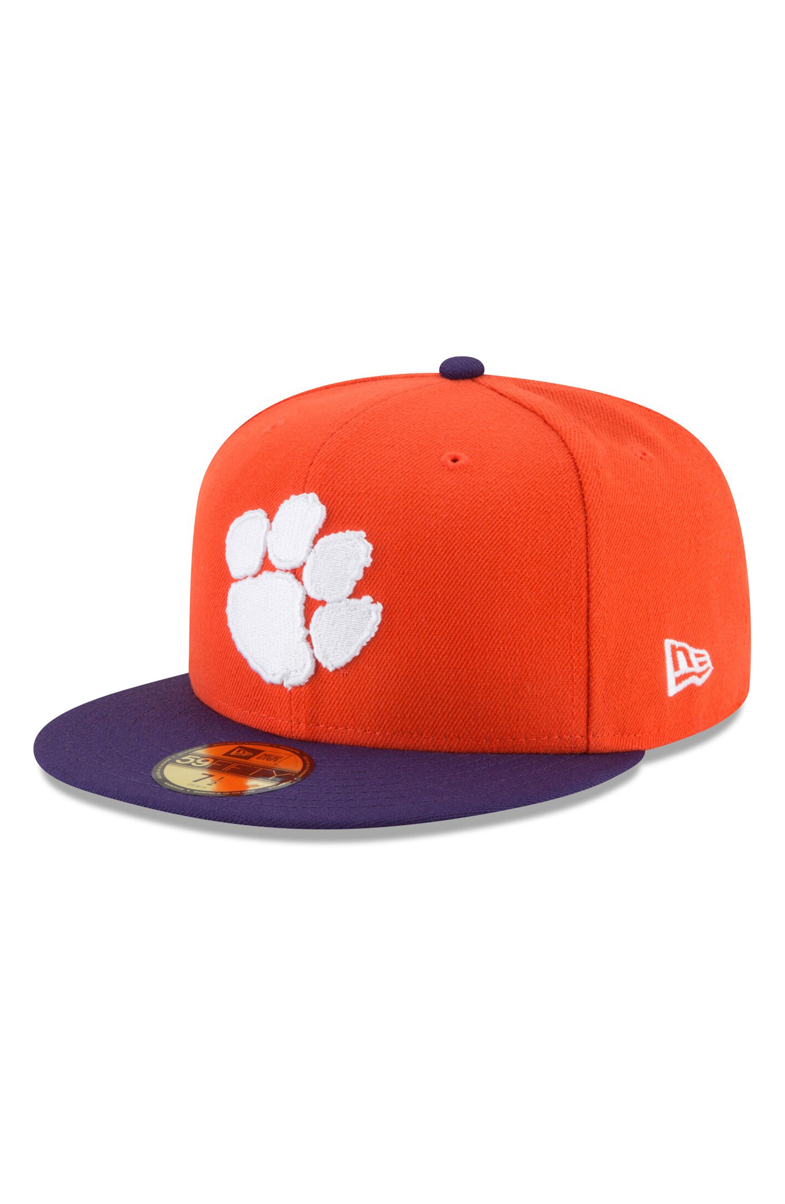 orange and white new era hat